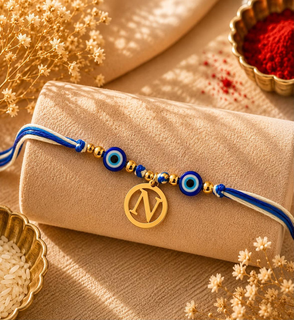 Personalized Initial Evil Eye Rakhi - Silver And Gold Plated